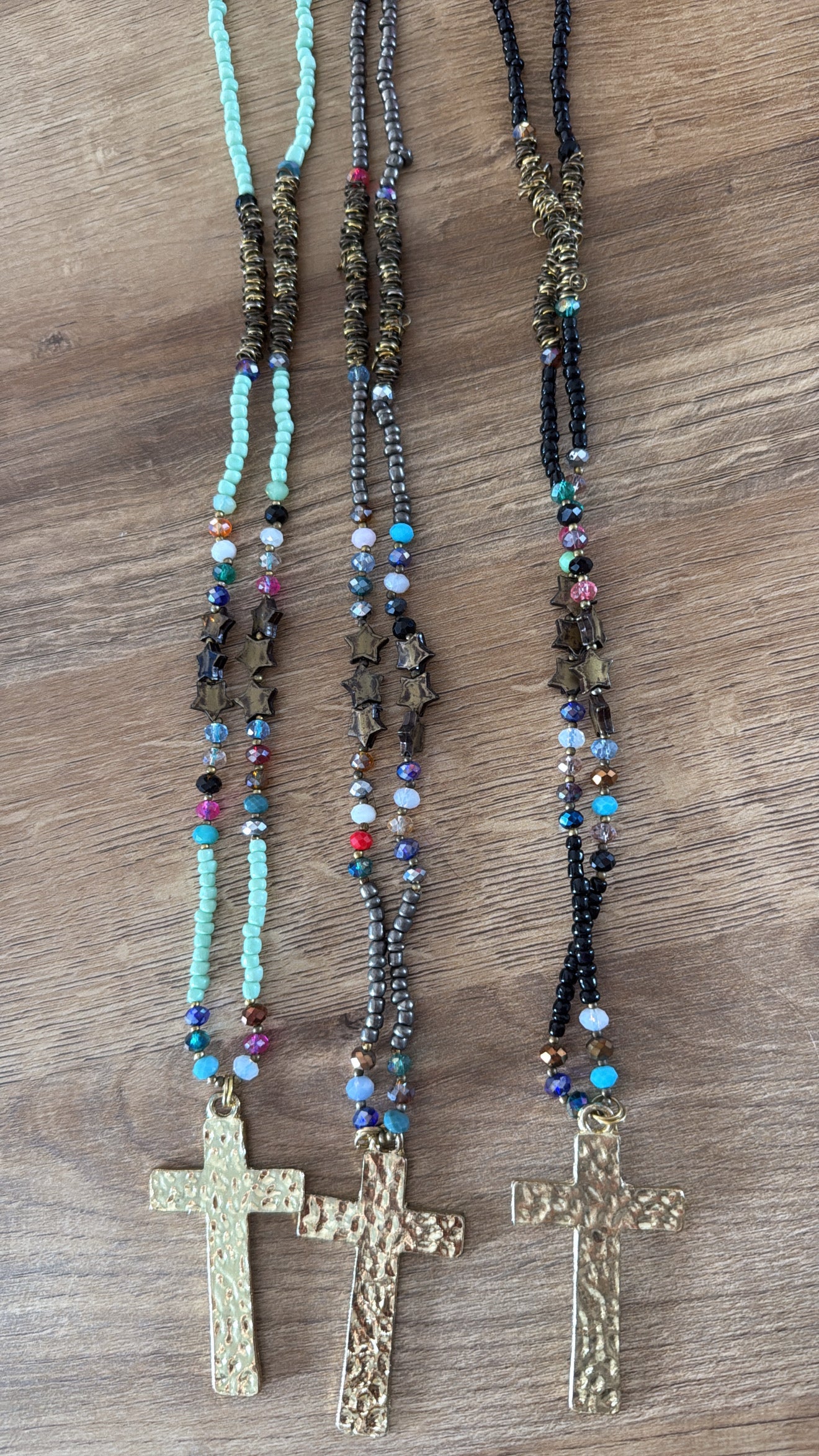 Sautoir croix dorée/perles